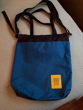 Topo Designs Blue & Black Cinch Tote with Yellow Logo Patch